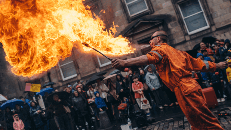 Crowds and street performers at the vibrant Edinburgh Festival Fringe, the world’s largest arts festival held every August